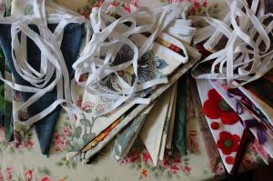 Our fabulous centenary bunting (with 100 pennants) made by our Knit & Stitch Club.