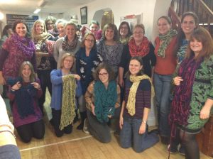 showing our arm knitted scarfs.